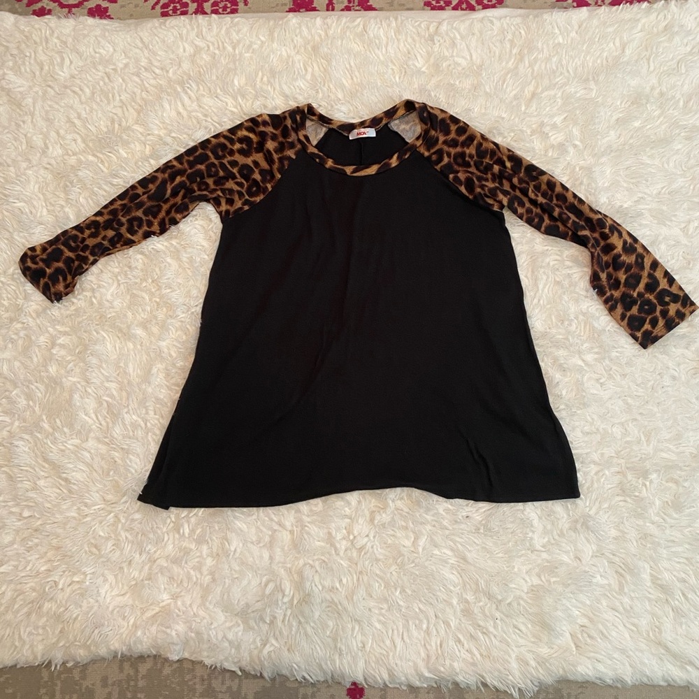 Black top with leopard detail